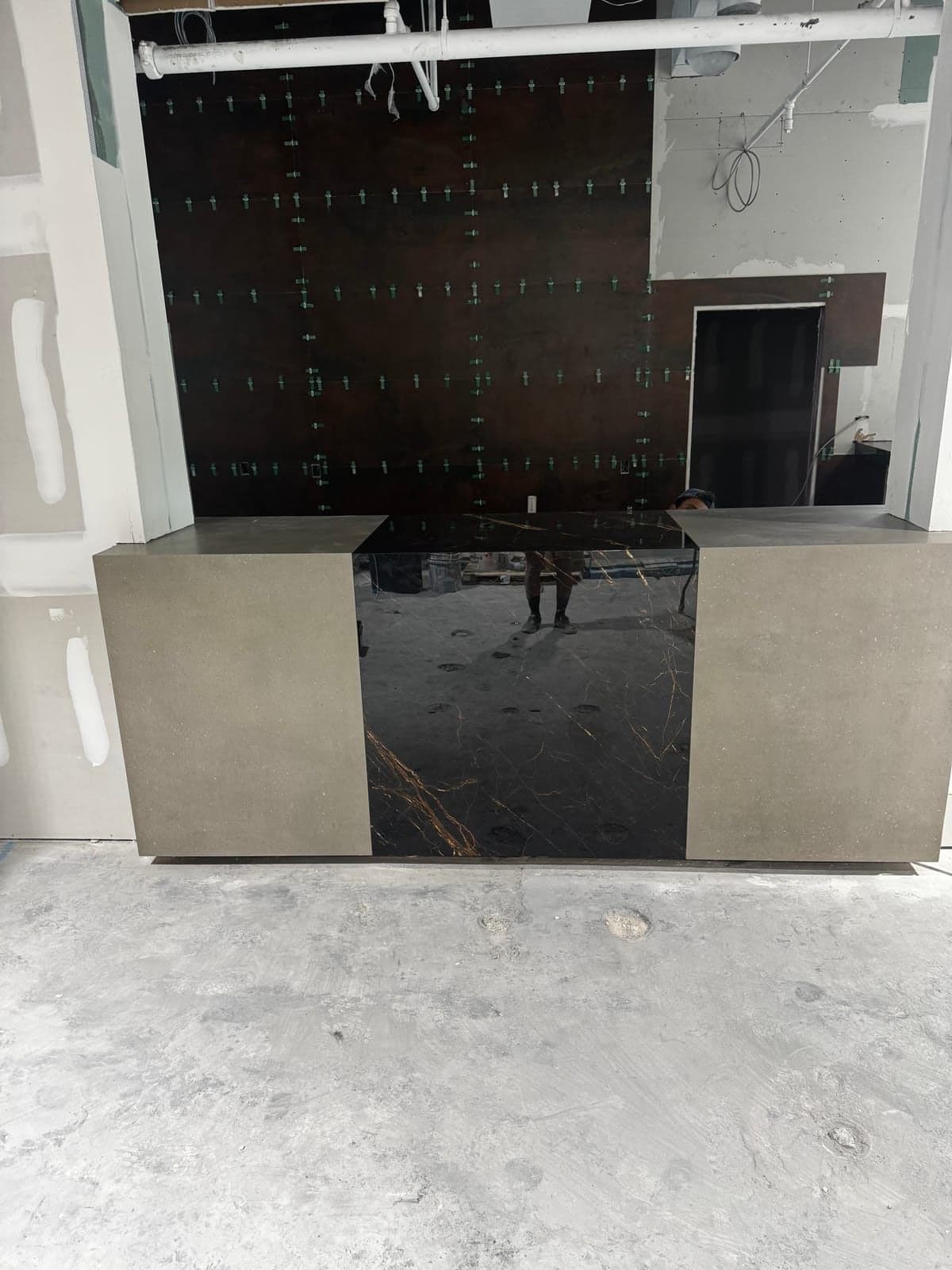 Dark marble kitchen countertop installation